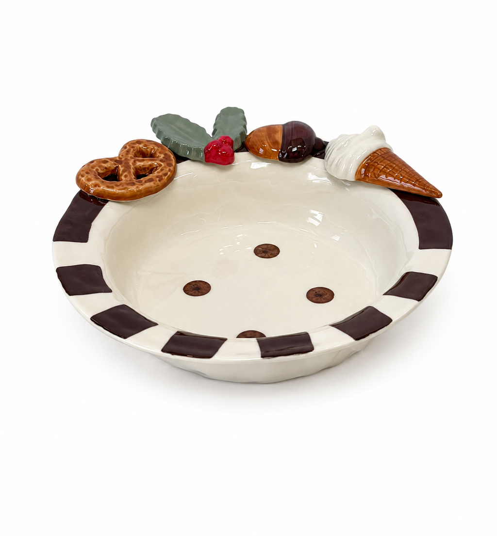 Handmade ceramic deep plate with whimsical 3D pretzel, acorn, holly, and ice cream rim details