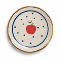 Handmade apple ceramic plate with red apple, blue dots, and speckled cream glaze