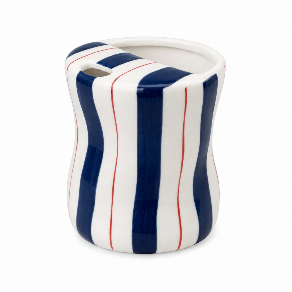 Navy striped ceramic mug with red accents and unique top opening