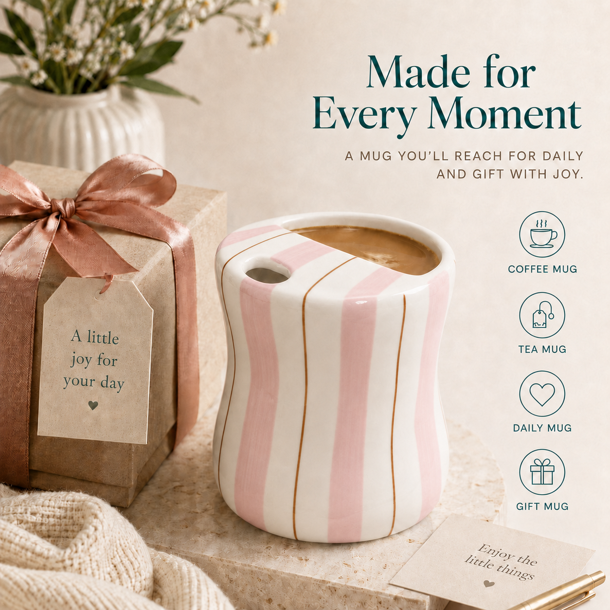 Pink striped ceramic mug with coffee styled beside a gift box