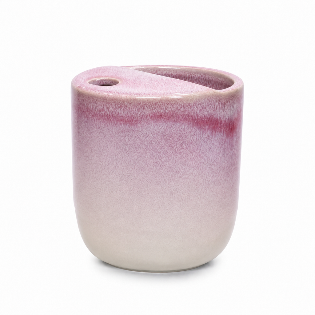 Pink flambé glaze ceramic mug with sculpted top opening