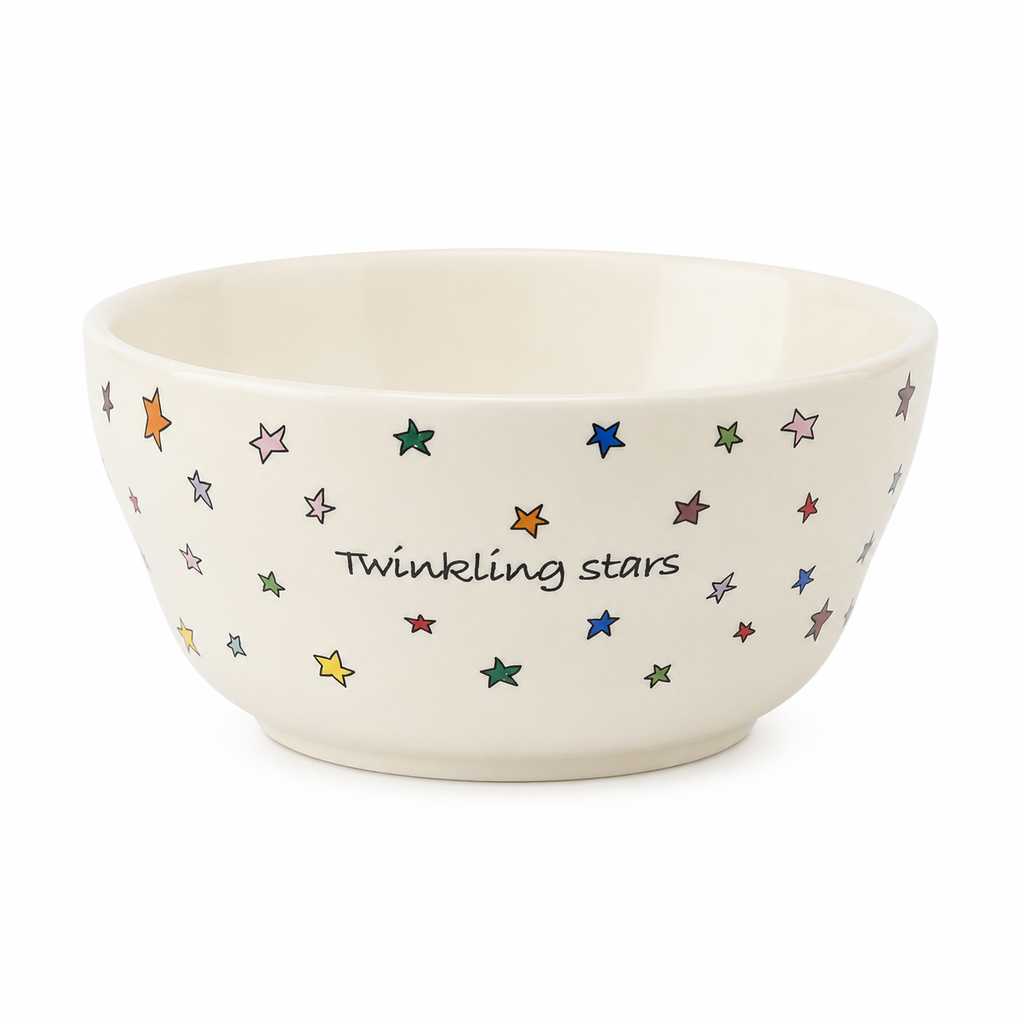 Twinkling Stars ceramic bowl with colorful star pattern and ivory glaze