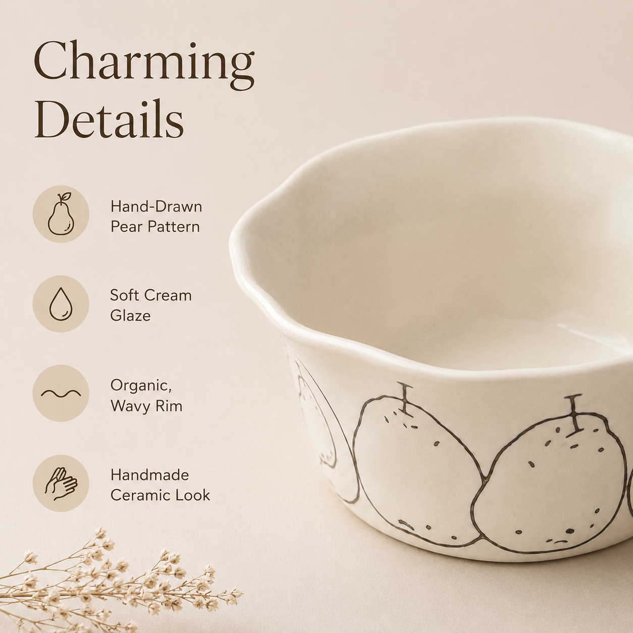 Close-up of pear ceramic bowl showing hand-drawn pear pattern and cream glaze