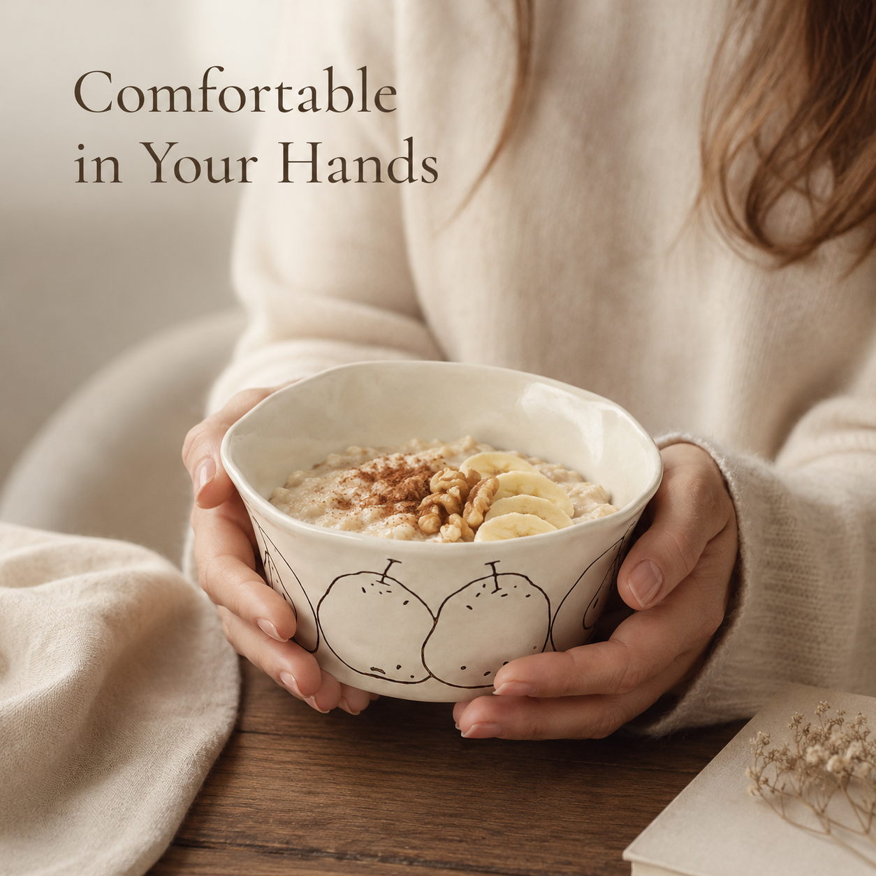 9 oz pear ceramic bowl held in hands and filled with oatmeal and banana