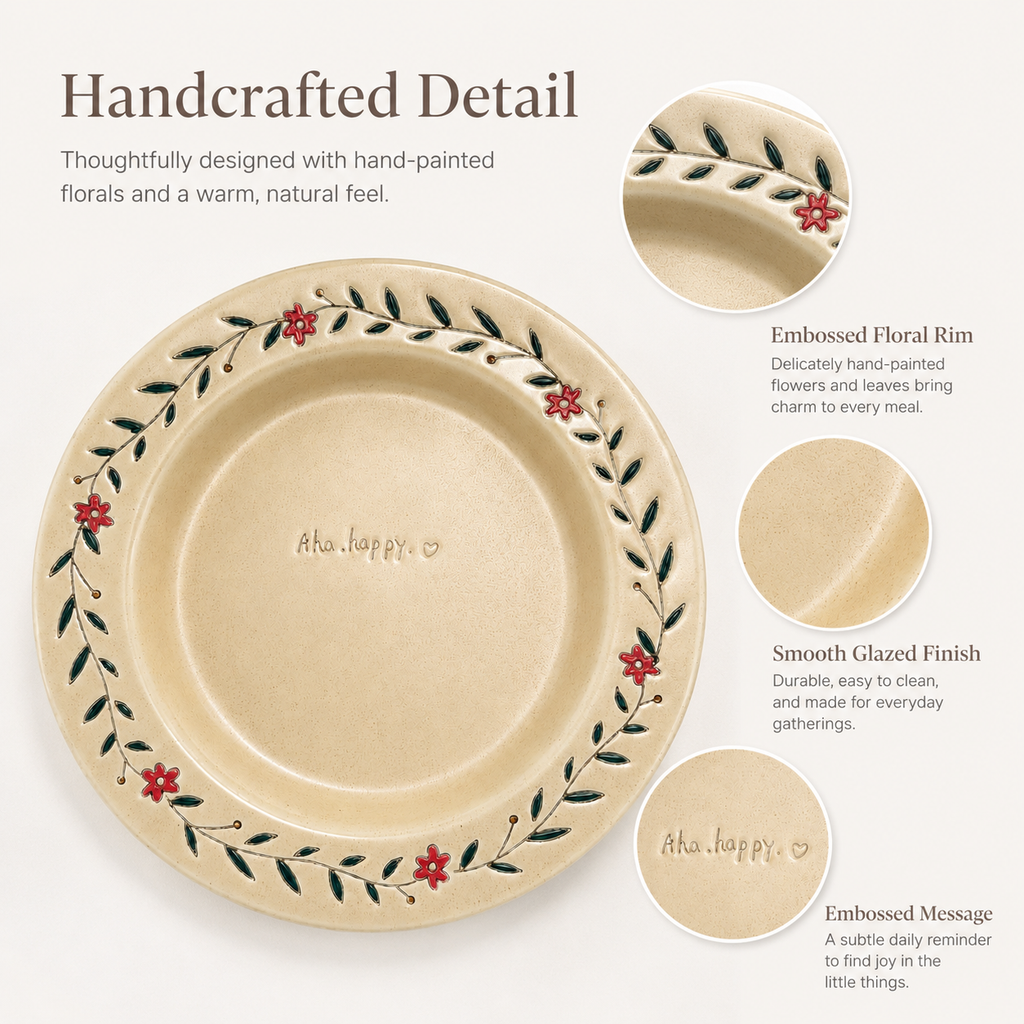 Close-up of hand-painted floral rim, cream glaze, and embossed Aha happy message