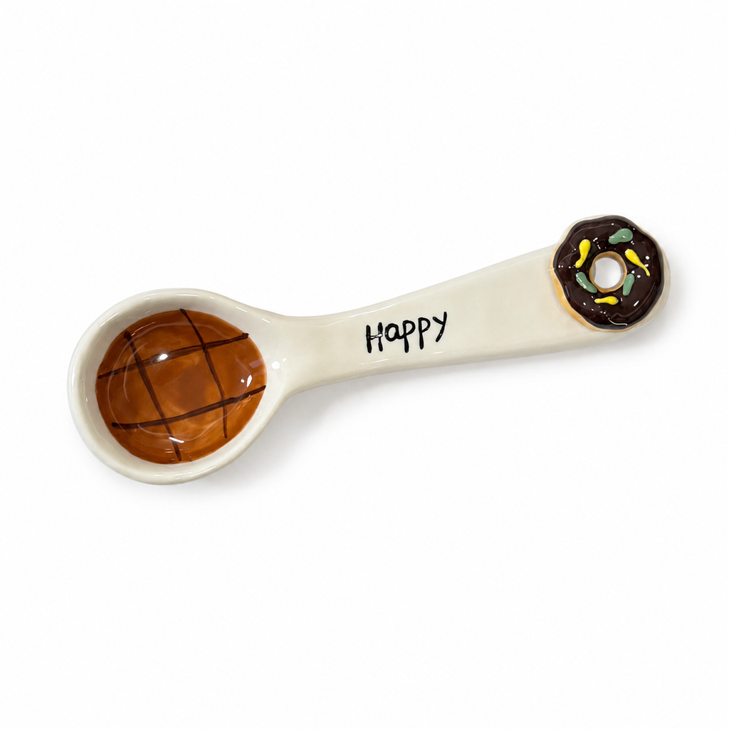 Handmade donut ceramic spoon with brown glaze and Happy lettering
