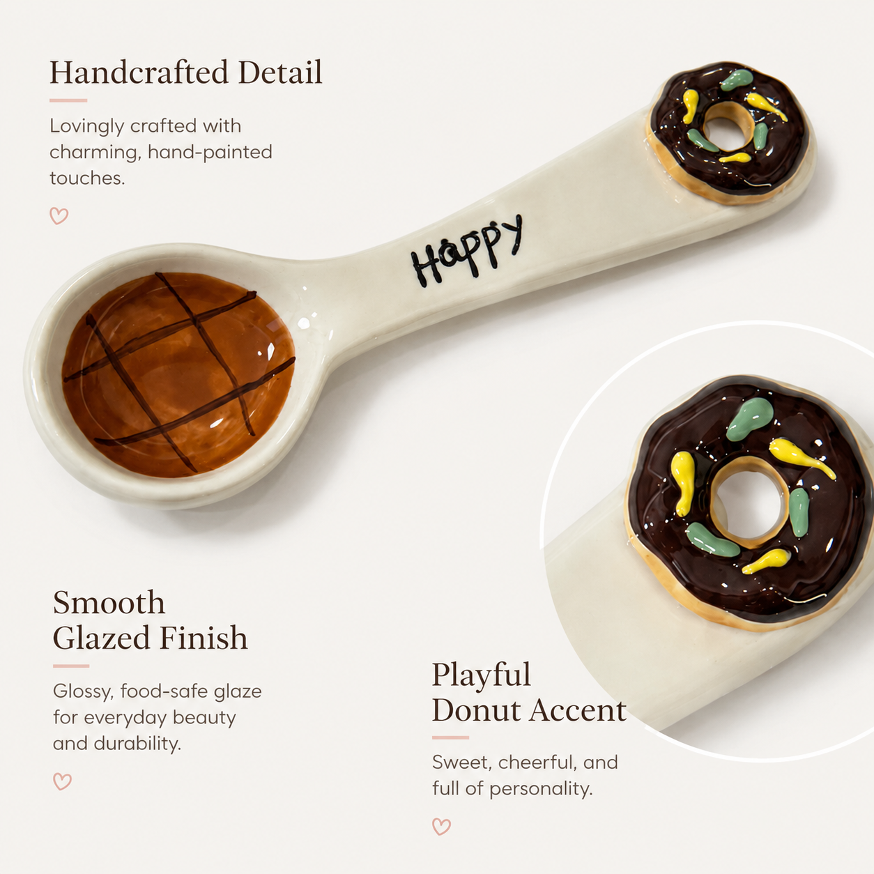 Close-up of handmade ceramic spoon with chocolate donut accent and glossy glaze